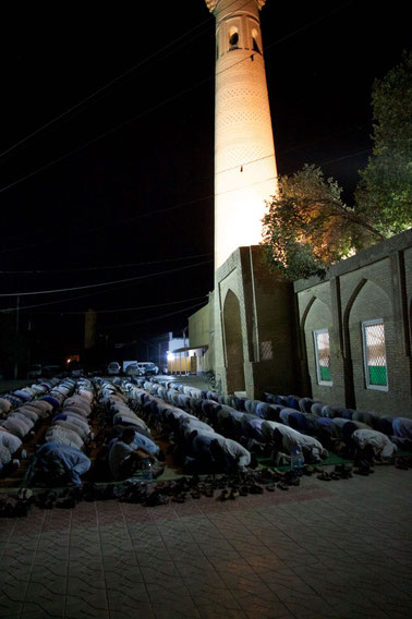 Uzbeks praying in front of the mosque at 9pm