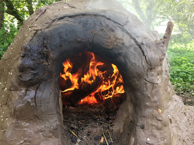 A reconstructed bread oven - image from AOC Archaeology on Twitter