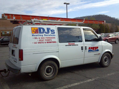 DJ's Heating service van