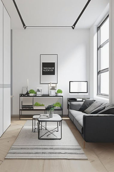 Minimalistische Wohnungseinrichtung schafft Ruhe und Struktur. Klare Linien, hochwertige Möbel und bewusste Auswahl sorgen für entspannte Wohnräume.