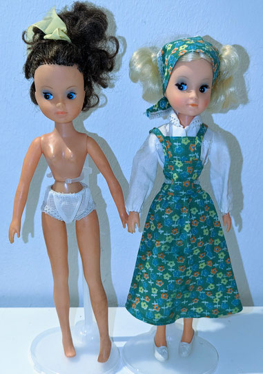 Two Squishhead Basic Fleur dolls.