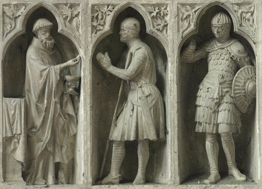 Scène de la « communion du chevalier » au revers de la façade occidentale (1250-1260) de la cathédrale Notre-Dame de Reims.