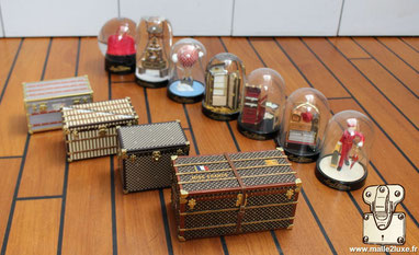   Louis Vuitton VIP gift This charming tradition of flower trunks was brought up to date in  2010  with the: Mini trunk, Snow globe, Paperweight, etc.   So many VIP gifts to reward the loyalty of the Maison's key accounts with the monogram.