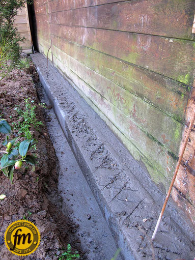 fondation mur de parpaing, fondation en bloc de chainage, fondation en bloc à bancher, monter un mur de parpaing pas cher, construire un mur de parpaing, mur de parpaing 10 cm, comment monter un mur, enduire un mur à la main, enduit leroy merlin,béton vpi