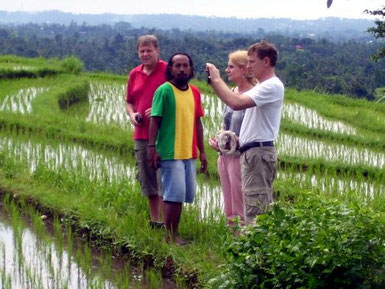 guests shooting photos in the ricefields