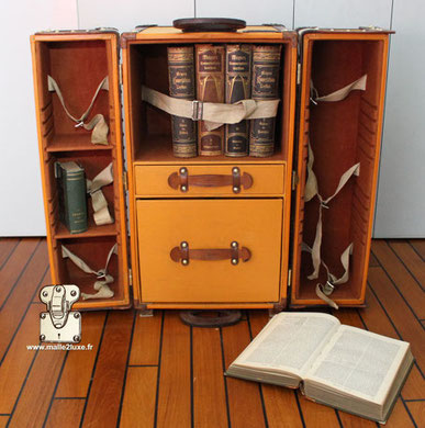 the results of a luxury louis vuitton open book trunk