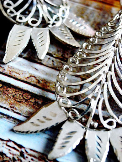 Kaiktasa Phal: sterling-silver, fine-filigree, tear-drop earrings; close-up of bottom, etched leaves