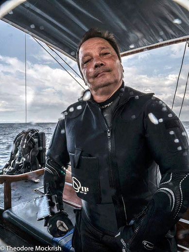 Photo about me on a boat before a dive