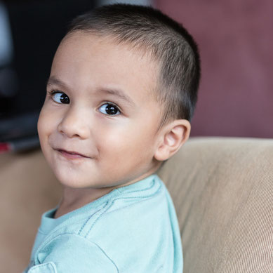 Photo of my yougest son Raphael, i called him when i was at his back and cough his look and smile on the picture.