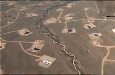 American landscape with shale gas drilling