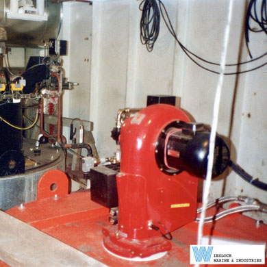 Weishaupt burner installed on a heater aboard a vessel, showing the Weishaupt burner motor on the right side of the burner.