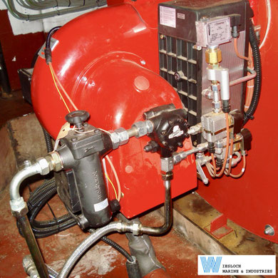 Weishaupt burner aboard an asphalt tanker, showing a Weishaupt scraping filter, Suntec fuel pump, Weishaupt oil preheater and Sauter pressure switch.