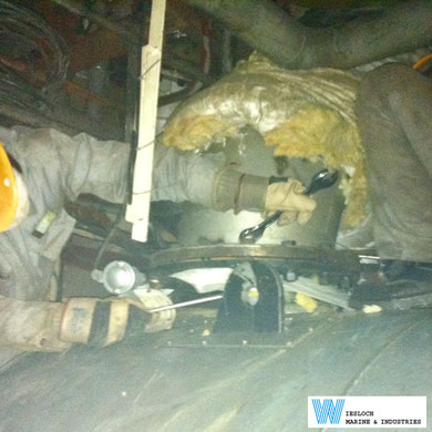 A PT100 temperature sensor installed on an industrial boiler during maintenance.