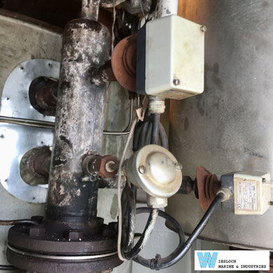 Two Jumo ATH-20 thermostats and a PT100 installed in the piping of a ship.