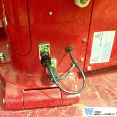 Weishaupt burner aboard a container ship, photographed during a service visit, showing Siemens RAR9 flame sensors.