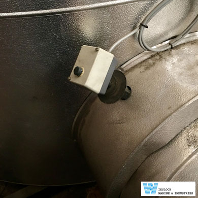 An ATH thermostat installed on a boiler.