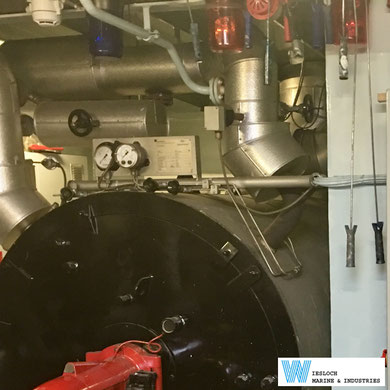 An ATH thermostat installed on a boiler on a ship.