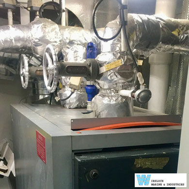 A PT100 temperature sensor and a ATH thermostat installed on the hot water system of a ship.