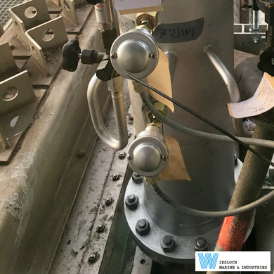 Two PT100 temperature sensors installed in the piping of a ship.