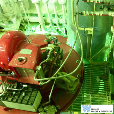 Weishaupt burner aboard a container ship, photographed during a service visit, showing oil hoses, an oil preheater and Parker solenoid valves.