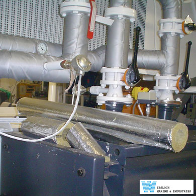 A factory with a PT100 temperature sensor installed in the pipes.