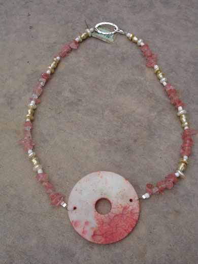 Salmon pearly Stone (one strand) - $30