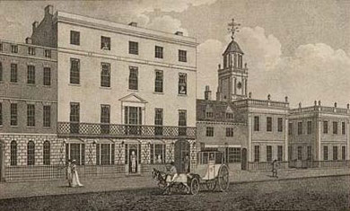 Centre: the symmetrical Georgian building is Lloyd's New Hotel. Right of centre: The low building is the Hen & Chickens. In the background is the tower of King Edward's Grammar School round the corner in New Street.
