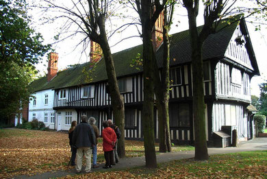 Old Grammar School. Onlookers are Kings Norton History Society members on a visit led by City Archaeologist, Mike Hodder.