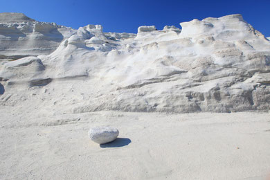 Sarakiniko beach a moon-like, incredibly white rocky coast with a small bay