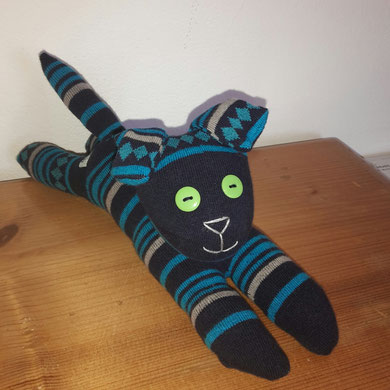 Sockenhund, schwarz mit türkis