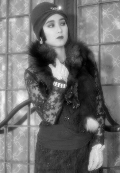 A modern model recreating the look of a "moga" -  a stylish 'modern girl' of 1920s Tokyo. 