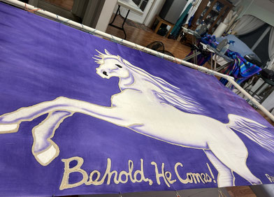 White Horse leaping on a purple background