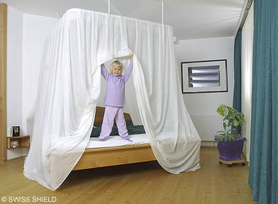 Canopy made from Swiss Shield microwave reflecting shielding fabric protecting children from elevated levels of electromagnetic radiation.