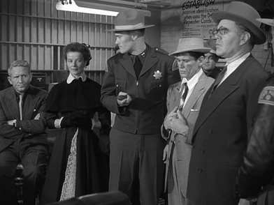 Una scena del film "Pat and Mike" del 1952 - Gli attori da sx: Spencer Tracy, Katherine Hepburn, Chuck Connors, Charles Bronson, e George Mathews