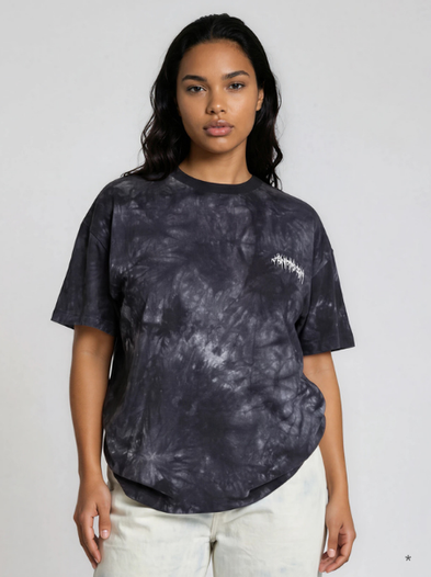model wearing a loose dark grey print t-shirt