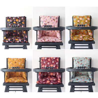 cette image représente 6 coussins de chaise haute haute de la marque combelle
