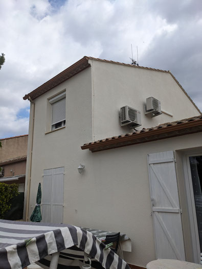 Artisan peintre à Cessenon-sur-Orb réalisant la peinture extérieure de façade et la rénovation des volets en bois, pour une finition durable et soignée adaptée au climat local.