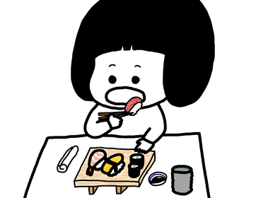 箸で寿司を食べる