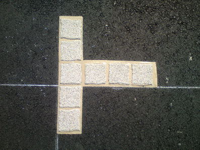 Détail d'un T en pavé résine - TTA