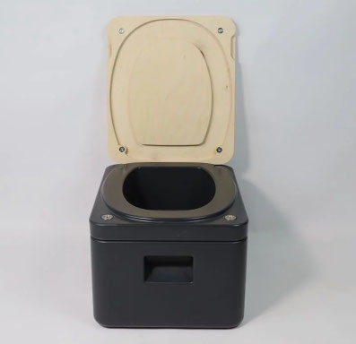 Trelino Origin S Trenntoilette mit beigem Deckel vor transparentem Hintergrund
