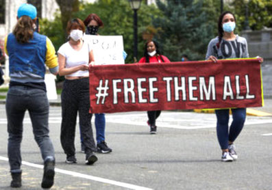 Demonstration foran Olympia fængslet i Washington D.C. den 11. april 2020 