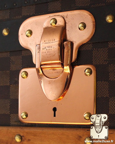 Louis Vuitton trunk lock copper