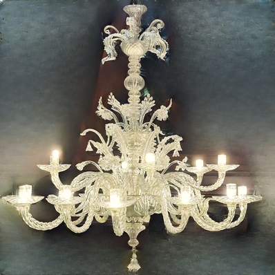 lampadario Cannaregio 10 più 5 luci in vetro di Murano lavorato a mano colore cristallo trasparente con eleganti bracci decorativi e raffinati dettagli veneziani