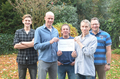 Unser 1. Vorsitzender Christian Schmitke mit N'JAM und dem Leiter des Kinderdorfs Bottrop, Thomas Evers