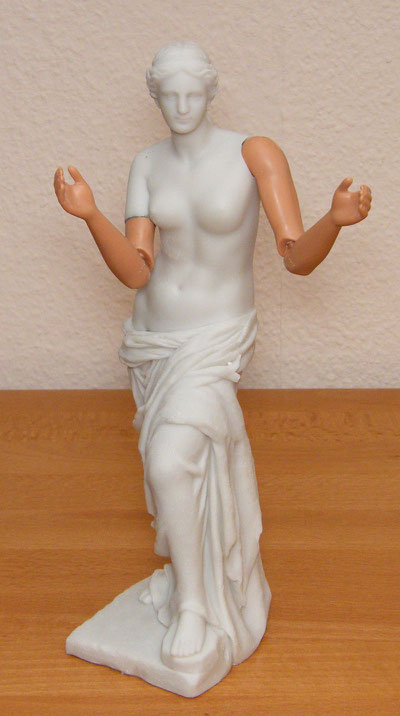 A replica of the Venus with implanted arms of a Barbie Doll - Height: approx 40cm