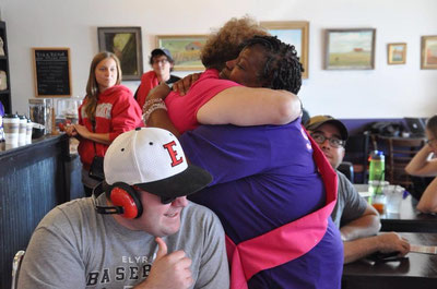 Carol & Mary hugging (right after Carol told Mary she was our recipient this year). In front, is Mary's incredible son, Matt, who kept the secret!! 