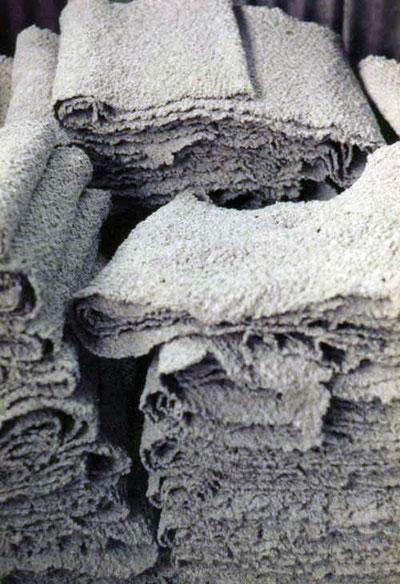 Processing latex: Low Quality Wet Colagulum Crepe Blanket (Courtesy Mitchel P. (ecoport) WikiCommons