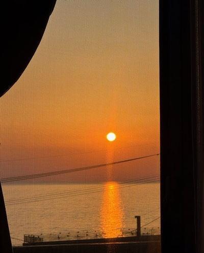 昨日の網戸越しのSUNSET