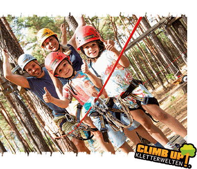 Family wearing helmets in the CLIMB UP! high ropes course – ready for a climbing adventure among the trees