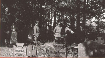 General Otto von Stülnagel, who survived WW1, pauses by the graves of German P.O.W's who did not return. The Oak crosses of the early WW2 dead were later replaced with smaller metal "Iron Crosses"